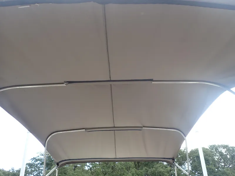 Slide: The Image of Bimini top of 2016 Hurricane SunDeck 2690 OB boat, viewed from below. - 32