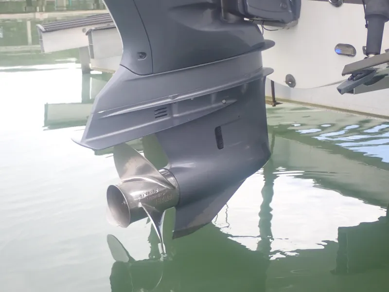 Slide: The Image of Outboard motor of 2016 Hurricane SunDeck 2690 OB boat in water. - 47