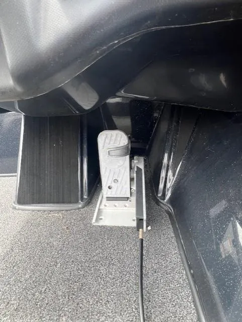 Slide: The Image of 2023 Nitro Z19 Pro boat pedal and footrest on textured flooring. - 4