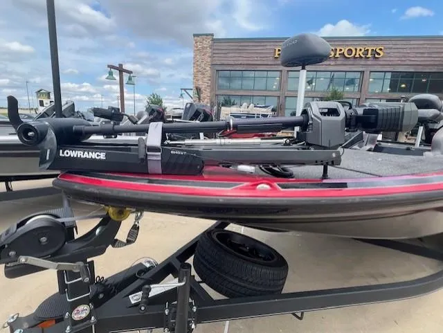 Slide: The Image of 2023 Nitro Z19 Pro boat with Lowrance equipment, parked outside a sporting goods store. - 6