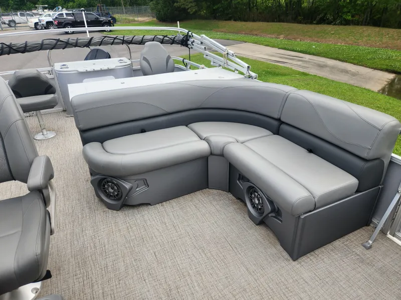 Slide: The Image of Luxurious seating on 2022 Avalon GS RF 2385 pontoon boat, featuring sleek gray upholstery. - 10