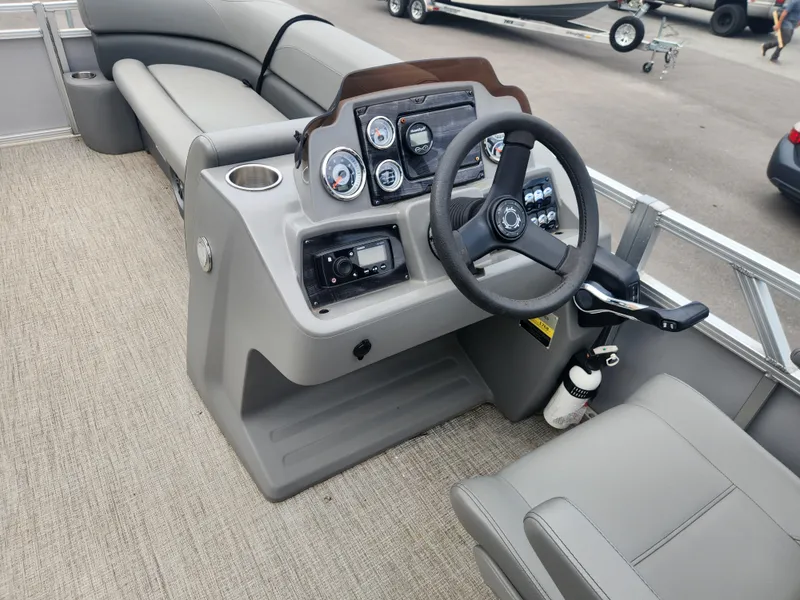 Slide: The Image of 2022 Avalon GS RF 2385 boat interior with steering console and seating. - 8