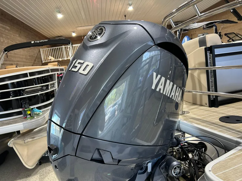 Slide: The Image of Yamaha 150 outboard motor on 2025 Godfrey Sweetwater 2286 QS pontoon boat. - 10