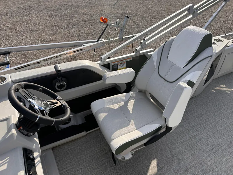 Slide: The Image of 2025 Tahoe Pontoon LTZ Cruise Rear Bench driver's seat and steering wheel. - 5