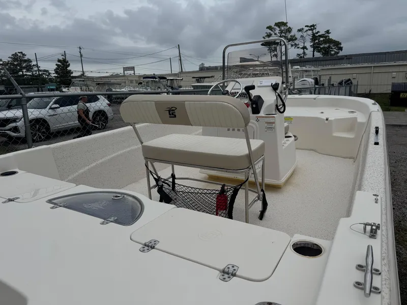 Slide: The Image of 2018 Carolina Skiff 198 DLV boat interior with seating and steering console. - 4