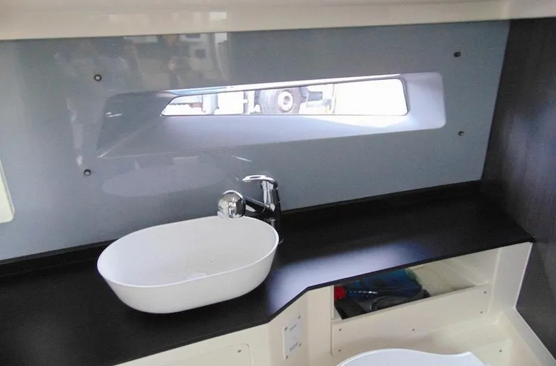 Slide: The Image of Modern Navan C30 2025 interior with sleek sink and faucet design. - 13