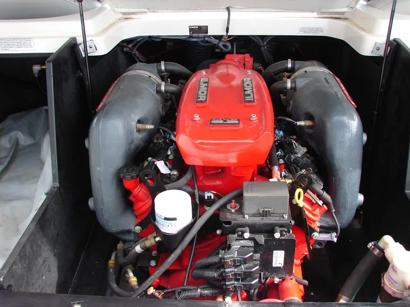 Slide: The Image of 2014 MasterCraft X46 engine compartment with a powerful red motor. - 17
