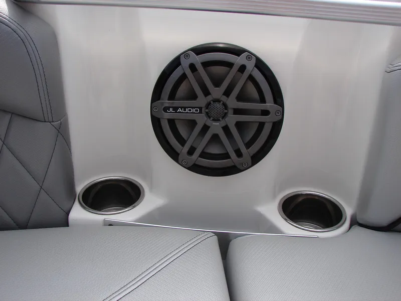 Slide: The Image of 2014 MasterCraft X46 boat interior with JL Audio speaker and cup holders. - 8