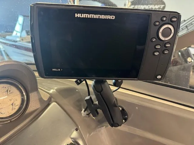 Slide: The Image of Humminbird Helix 7 fish finder on 2006 Monterey 234FS boat dashboard. - 15