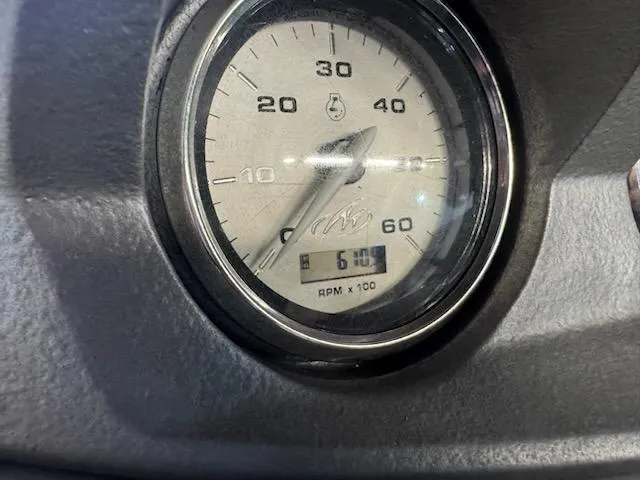 Slide: The Image of Close-up of a 2006 Monterey 234FS tachometer showing 600 RPM. - 16