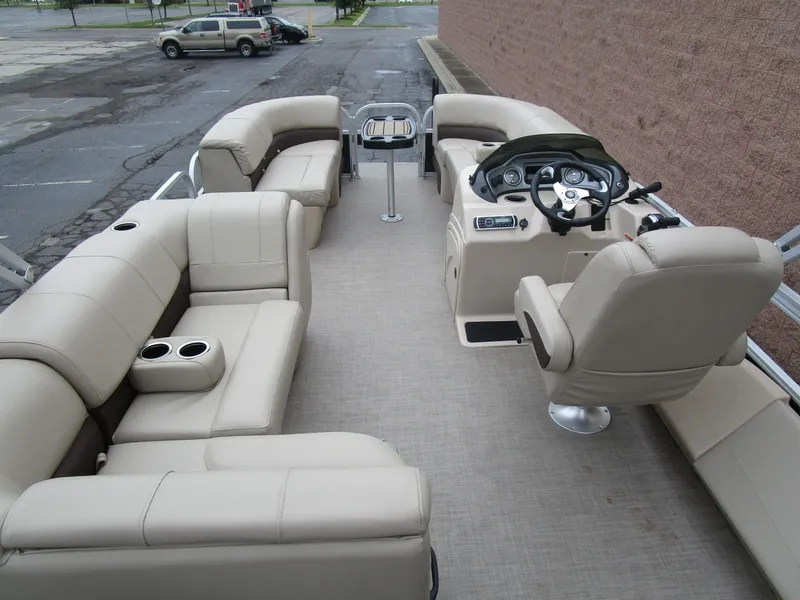 Slide: The Image of 2019 Sun Tracker SPORT FISH 22 XP3 pontoon boat with spacious seating and modern helm. - 11