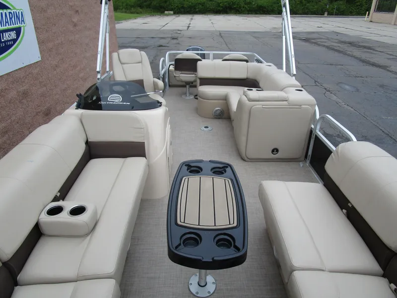 Slide: The Image of 2019 Sun Tracker SPORT FISH 22 XP3 pontoon boat with spacious seating and table. - 4