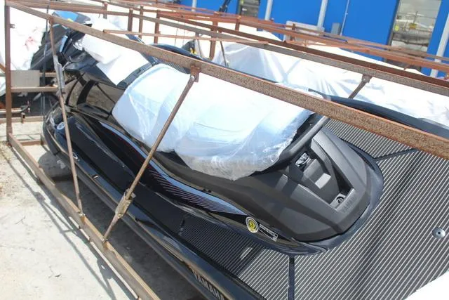 Slide: The Image of 2025 Yamaha Marine Waverunner VX1050C-BA in shipping crate, partially covered, ready for delivery. - 7