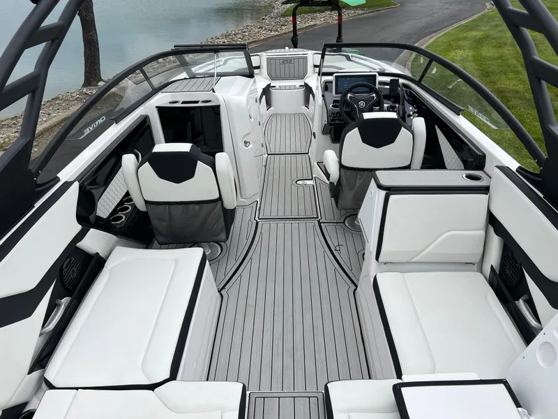 Slide: The Image of 2025 Yamaha Boats 252SD interior with sleek seating and modern dashboard design. - 10