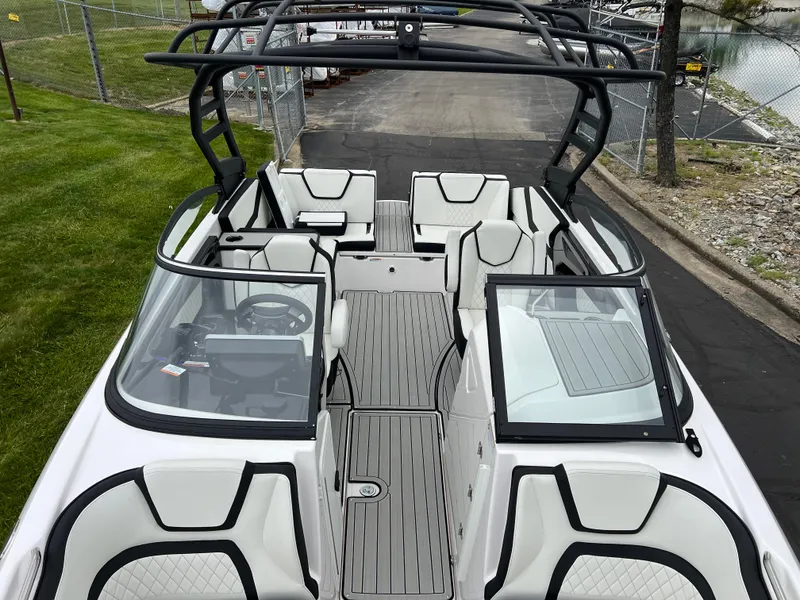 Slide: The Image of 2025 Yamaha Boats 252SD interior with sleek seating and modern design. - 19