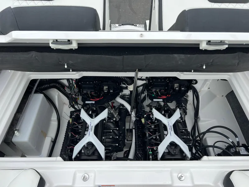 Slide: The Image of 2025 Yamaha Boats 252SD engine compartment with dual engines and wiring. - 25