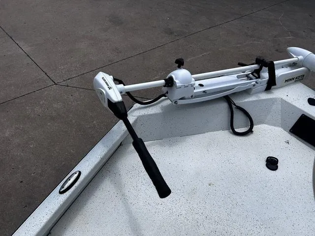 Slide: The Image of Trolling motor on a 2017 Ranger RB190 boat, mounted on a concrete surface. - 11