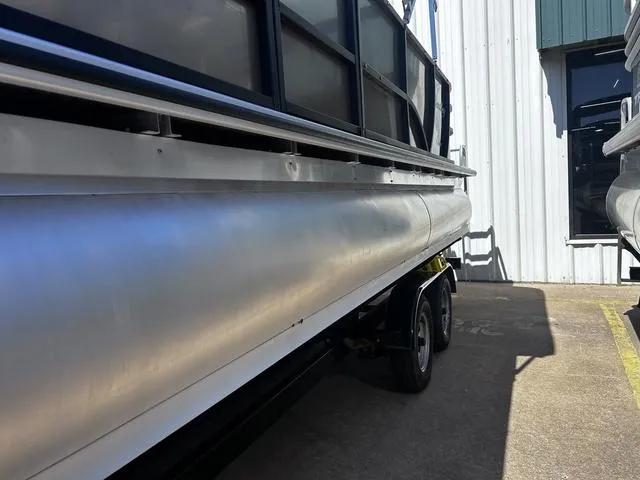 Slide: The Image of 2019 Bentley Pontoons 223 Bentley Elite Admiral pontoon boat on trailer, side view. - 11