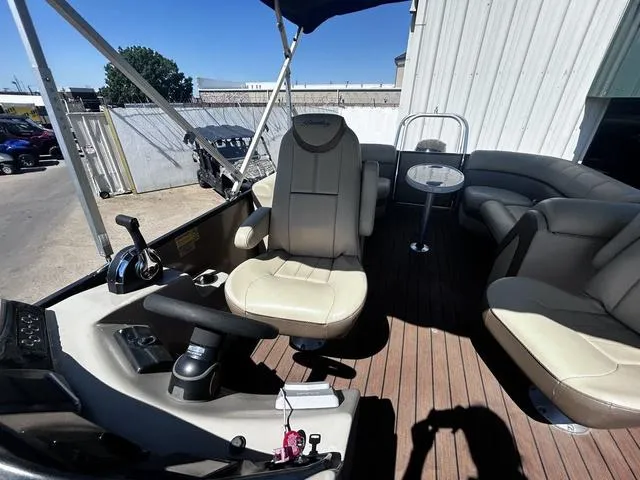 Slide: The Image of 2019 Bentley Pontoons 223 Bentley Elite Admiral interior with seating and controls. - 15