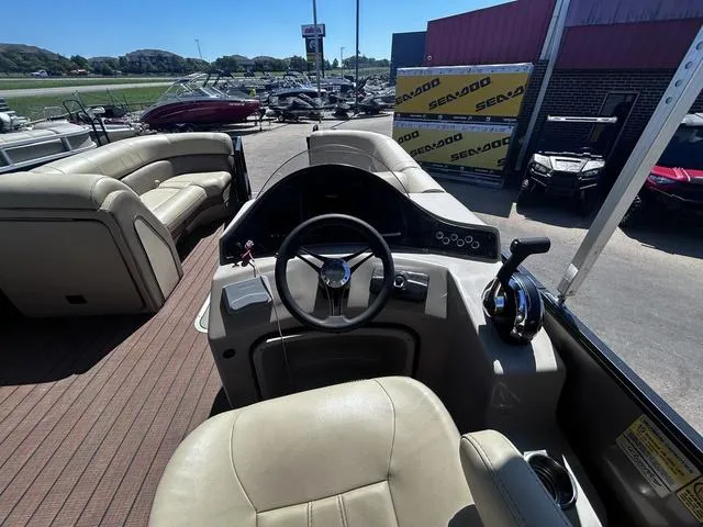 Slide: The Image of 2019 Bentley Pontoons 223 Bentley Elite Admiral interior with steering wheel and seating. - 19