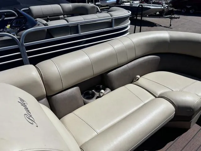 Slide: The Image of 2019 Bentley Pontoons 223 Bentley Elite Admiral with beige seating and cup holders. - 23