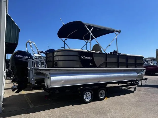 Slide: The Image of 2019 Bentley Pontoons 223 Bentley Elite Admiral on trailer, featuring Mercury outboard motor. - 3