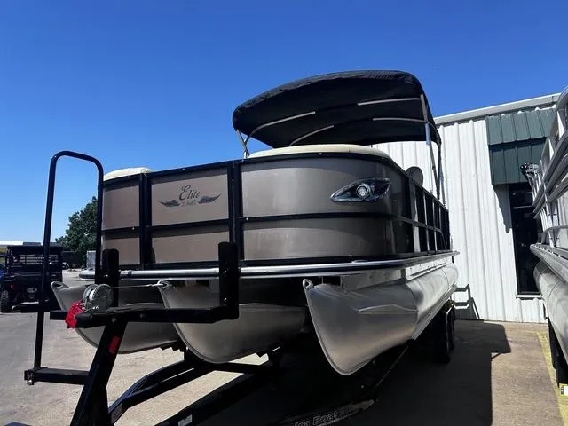 Slide: The Image of 2019 Bentley Pontoons 223 Bentley Elite Admiral pontoon boat on trailer, parked outdoors. - 9