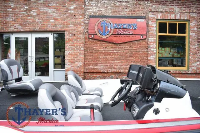 Slide: The Image of 2015 Nitro Z Series Z-8 boat at Thayer's Marine, featuring modern seating and controls. - 13