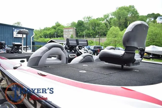 Slide: The Image of 2015 Nitro Z Series Z-8 boat with seating and control panel, displayed outdoors. - 14