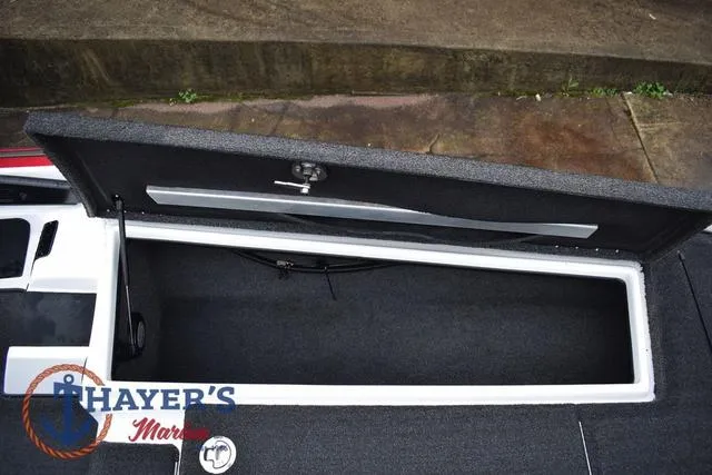 Slide: The Image of Open storage compartment of 2015 Nitro Z Series Z-8 boat. - 26