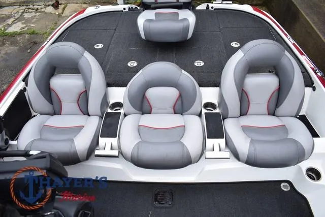 Slide: The Image of Three gray and red seats on a 2015 Nitro Z Series Z-8 boat. - 32