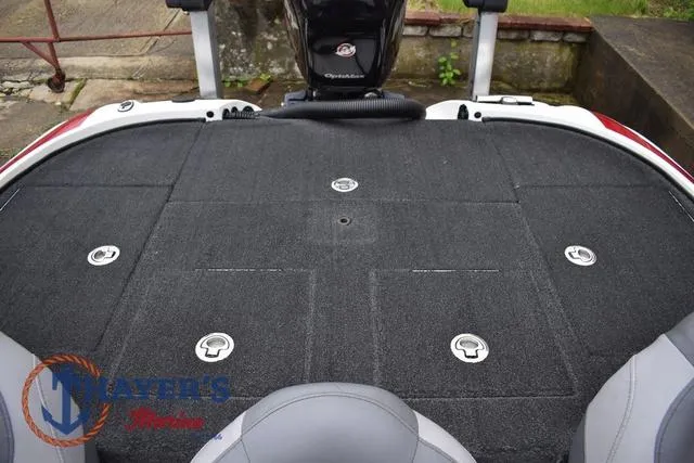 Slide: The Image of 2015 Nitro Z Series Z-8 boat deck with carpeted surface and seating area. - 34