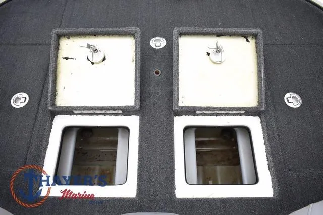 Slide: The Image of 2015 Nitro Z Series Z-8 boat storage compartments with Harris Marine logo. - 35