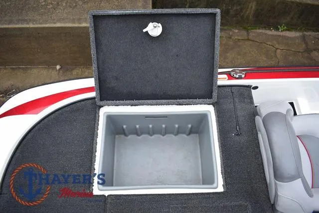 Slide: The Image of Open storage compartment on 2015 Nitro Z Series Z-8 boat deck. - 37