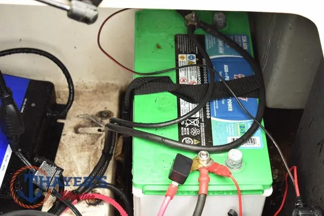 Slide: The Image of Battery compartment of a 2015 Nitro Z Series Z-8 boat with wiring connections. - 41