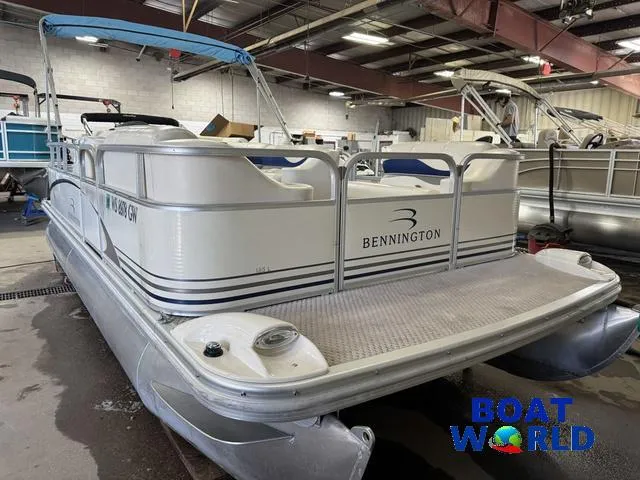Slide: The Image of 2005 Bennington 186L Pontoon boat in indoor storage at Boat World. - 30