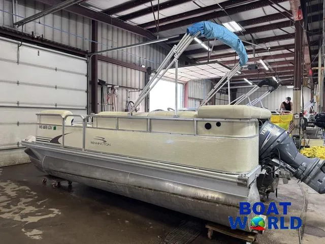 Slide: The Image of 2005 Bennington 186L Pontoon boat in a warehouse, featuring a Yamaha outboard motor. - 35