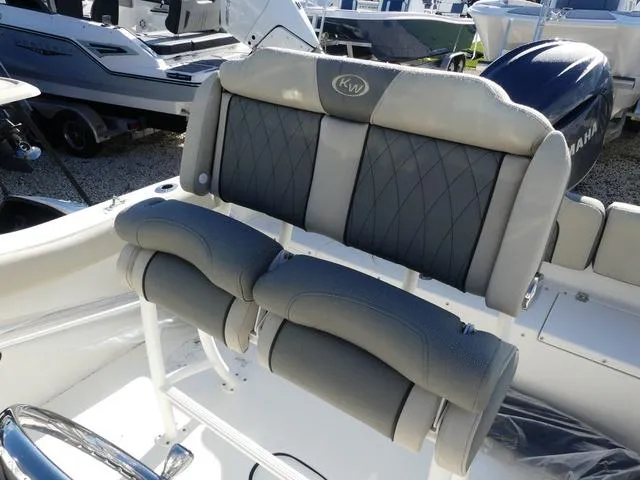 Slide: The Image of 2025 Key West 203 FS boat seating with gray upholstery and diamond stitching. - 12