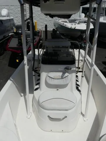 Slide: The Image of 2013 NauticStar 1910 NauticBay boat interior with seating and console. - 14