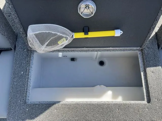 Slide: The Image of Fishing net and storage compartment on 2023 Lund 1975 Tyee Sport boat. - 15