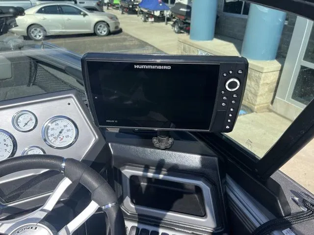 Slide: The Image of Dashboard of 2023 Lund 1975 Tyee Sport with Humminbird Helix 10 fish finder. - 19
