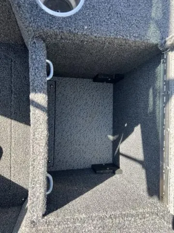 Slide: The Image of Interior storage compartment of 2023 Lund 1975 Tyee Sport boat. - 30
