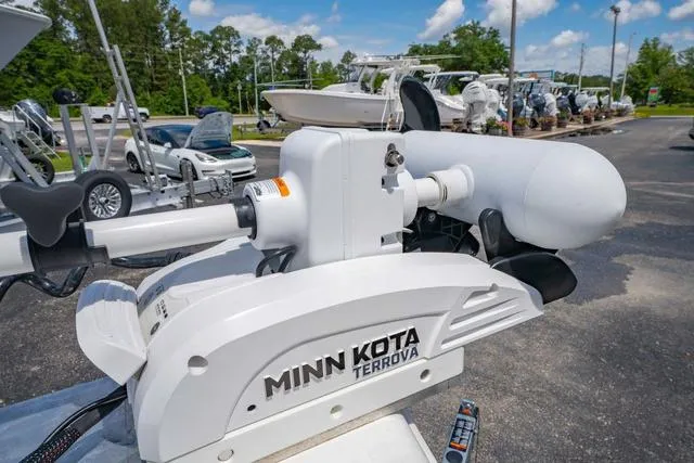 Slide: The Image of Minn Kota Terrova motor on 2025 Sea Pro 250 Bay boat, parked outdoors. - 26