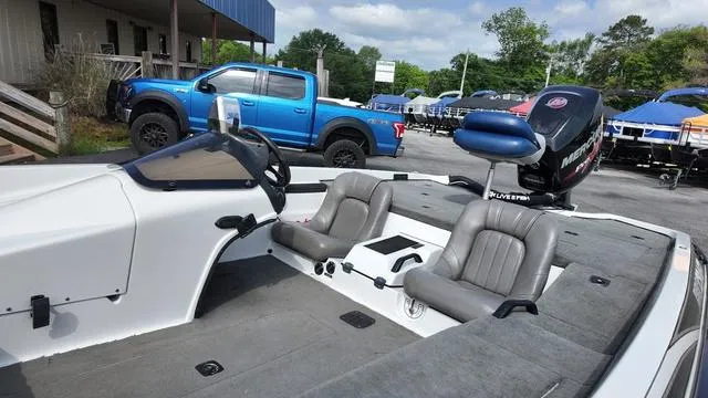 Slide: The Image of 1997 Pro Craft 200 Super Pro boat with dual seats and Mercury outboard motor. - 10