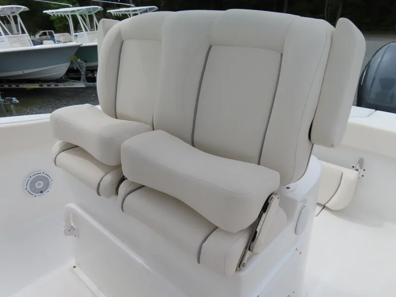 Slide: The Image of 2023 Sea Hunt Gamefish 25 boat seats, featuring plush white upholstery. - 23