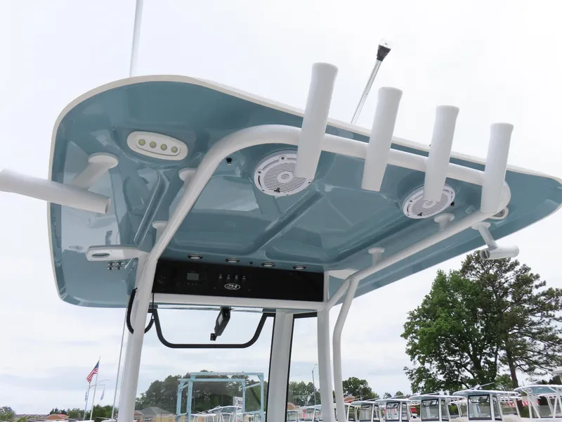 Slide: The Image of 2023 Sea Hunt Gamefish 25 boat with rod holders and speakers on the T-top. - 29