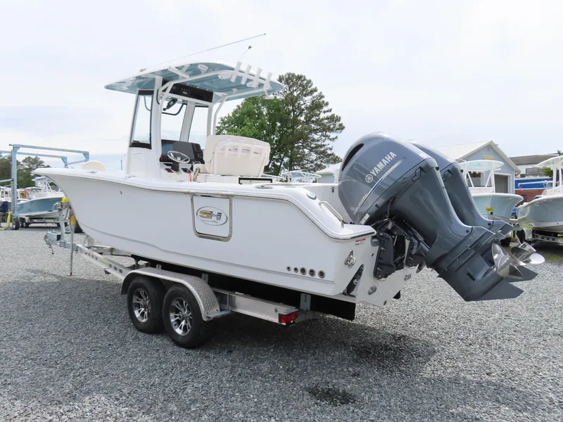 Slide: The Image of 2023 Sea Hunt Gamefish 25 boat on trailer with Yamaha outboard engine. - 3