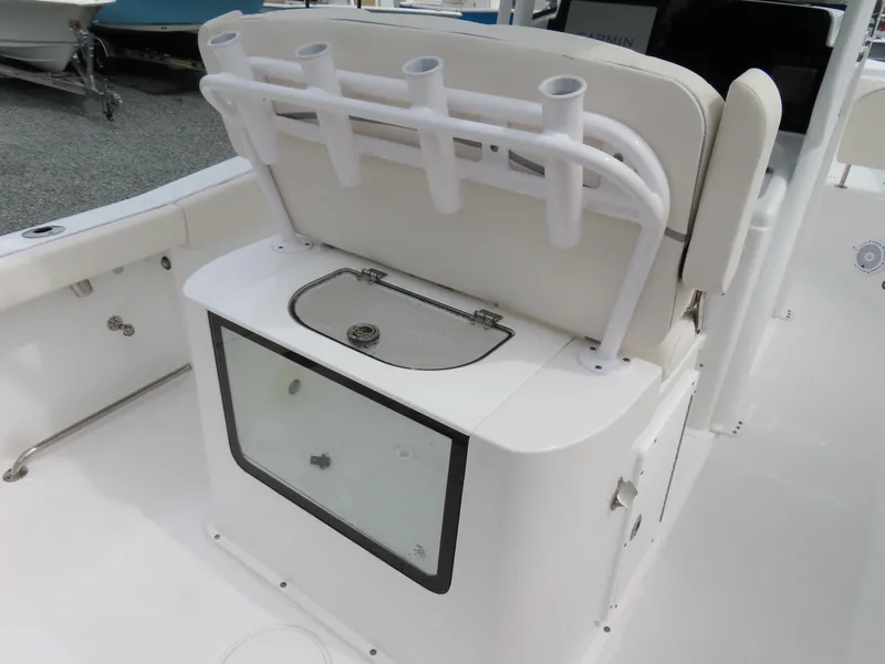 Slide: The Image of 2023 Sea Hunt Gamefish 25 boat with rod holders and livewell. - 30