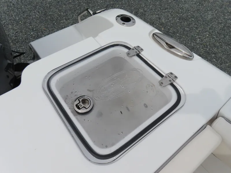 Slide: The Image of 2023 Sea Hunt Gamefish 25 boat deck with storage compartment. - 43