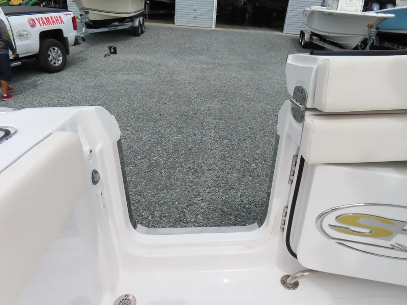 Slide: The Image of 2023 Sea Hunt Gamefish 25 boat interior with open transom door. - 46